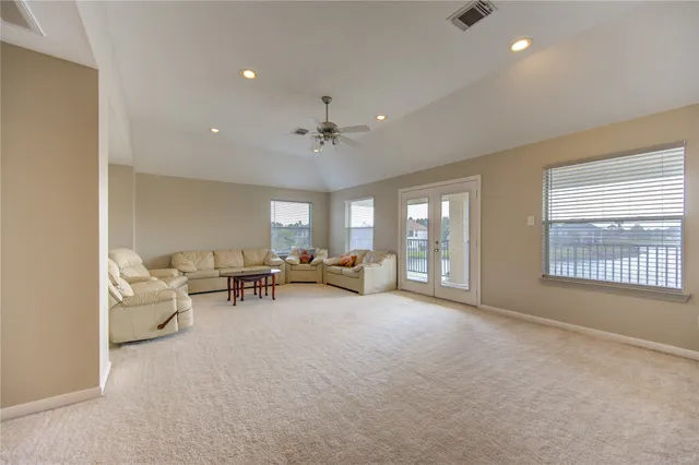 a view of a balcony with furniture