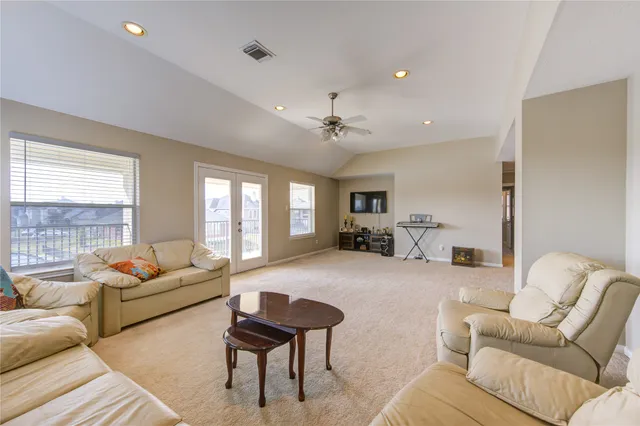 a view of a building with a yard