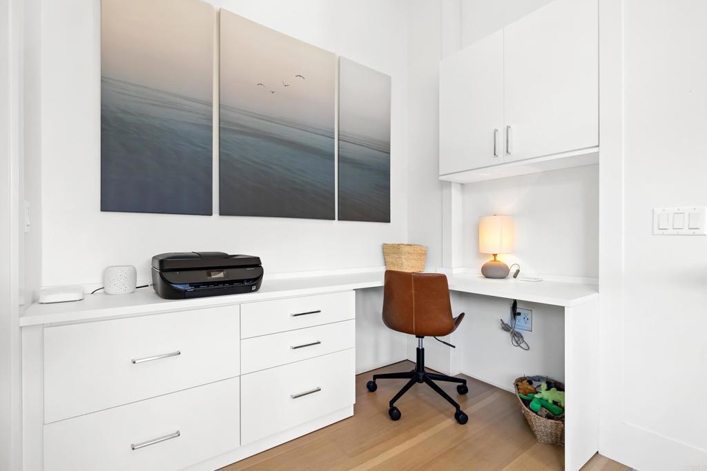 236 24th Street Del Mar, CA 92014 - Photo 16 of 44 a bathroom with a sink a potted plant and a shower