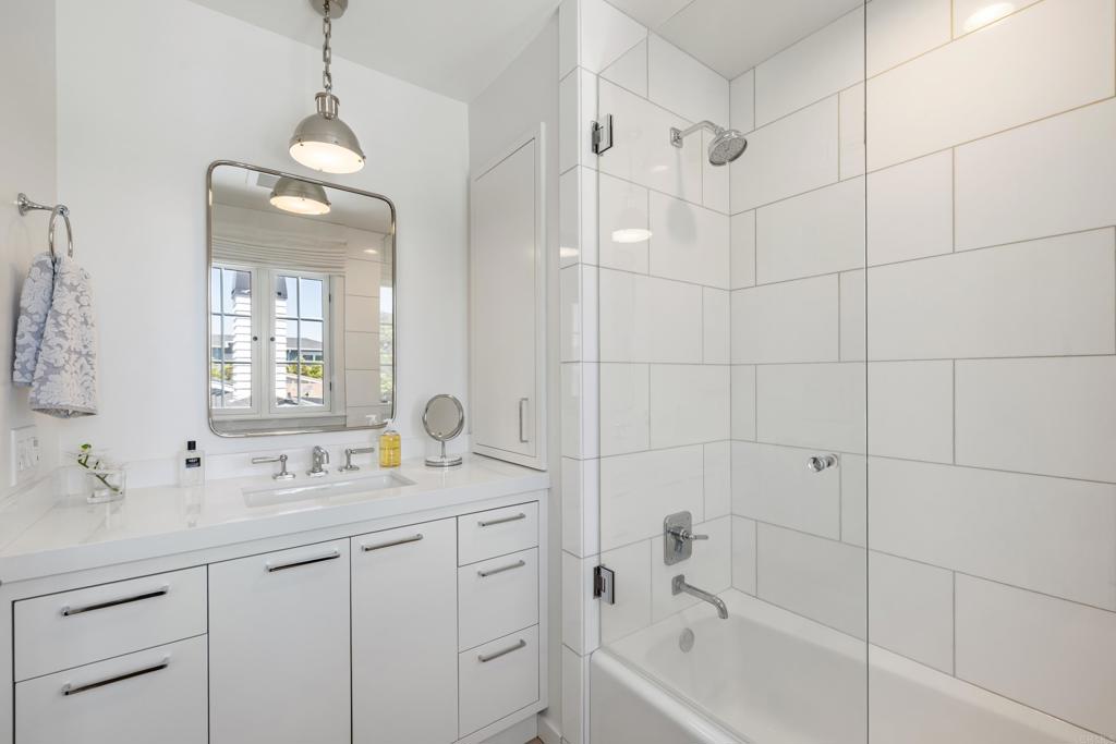 236 24th Street Del Mar, CA 92014 - Photo 25 of 44 a bathroom with a sink a toilet and shower