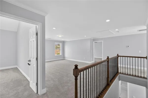 a view of a hallway with closet area