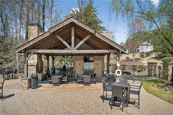 a view of swimming pool with outdoor space and seating area