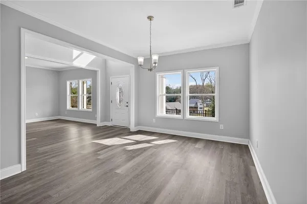 a view of livingroom with hardwood floor and window
