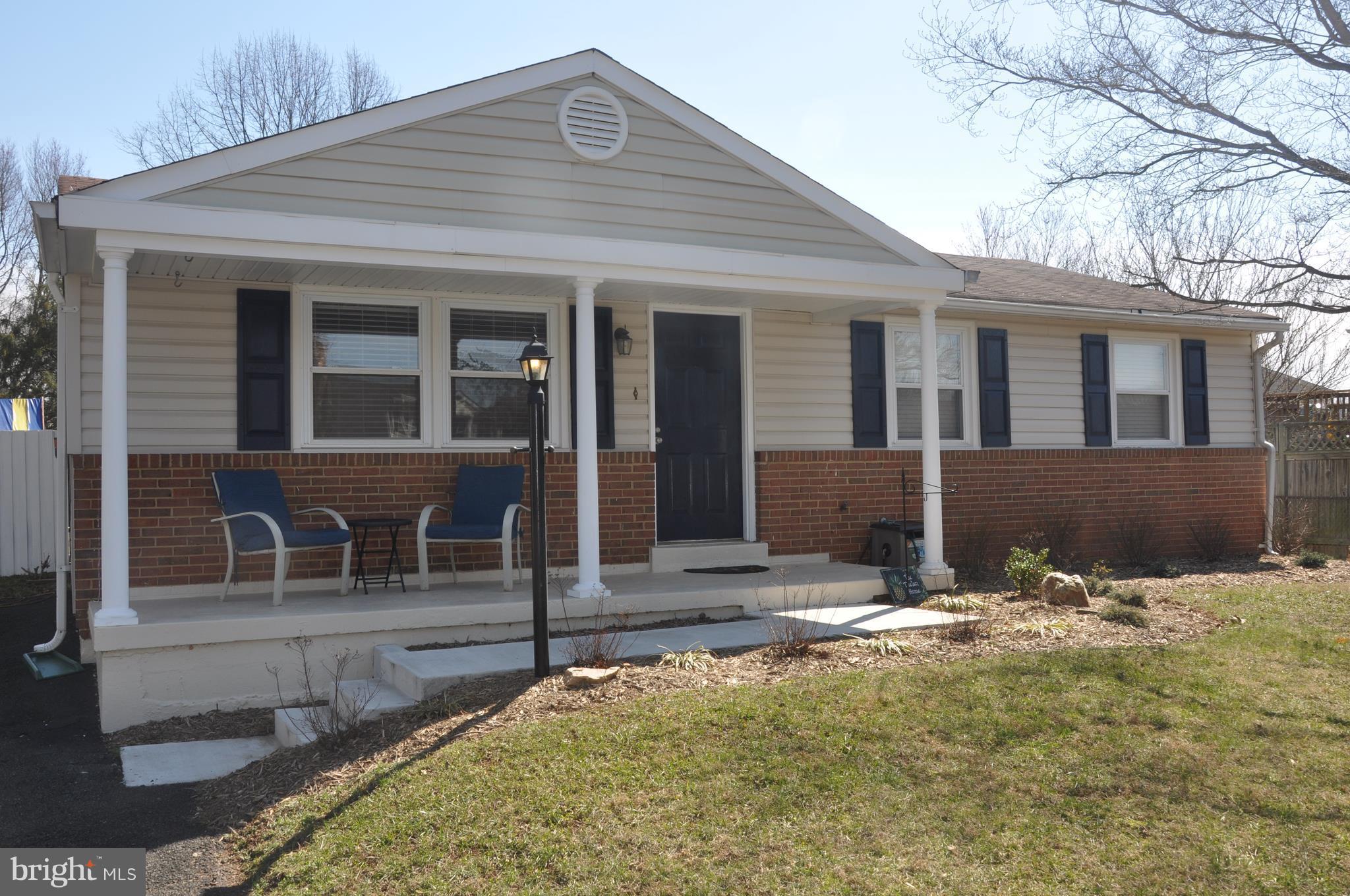 13847 Meadowbrook Road Woodbridge, VA 22193 - Photo 1 of 29 a front view of a house with yard