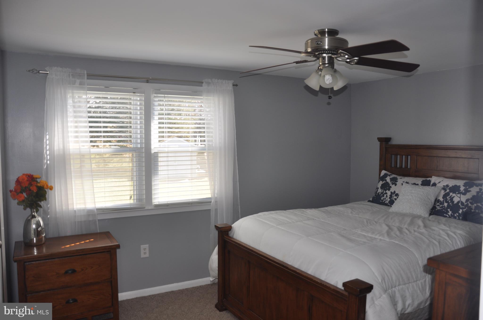 13847 Meadowbrook Road Woodbridge, VA 22193 - Photo 20 of 29 a bedroom with a bed and a window