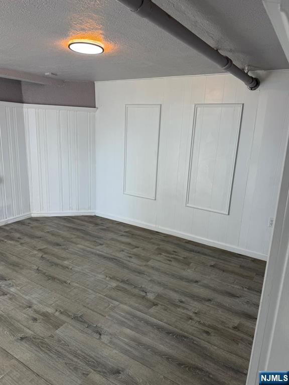 1283 Valley Road, Unit 7 Montclair, NJ 07043 - Photo 20 of 26 a view of empty room with wooden floor