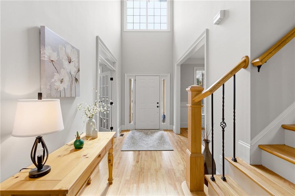 810 Ravenstone Way Canton, GA 30115 - Photo 12 of 51 a view of a living room and bathroom