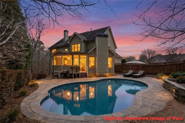 a view of swimming pool with outdoor seating and plants