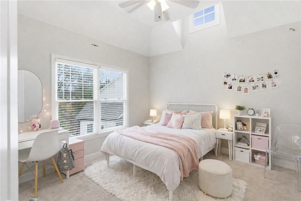 810 Ravenstone Way Canton, GA 30115 - Photo 32 of 51 a bedroom with a bed and a window