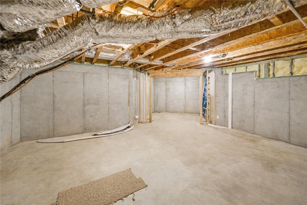 810 Ravenstone Way Canton, GA 30115 - Photo 41 of 51 a view of an empty room