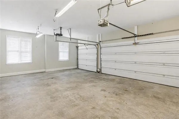 a view of a room with racks and white walls