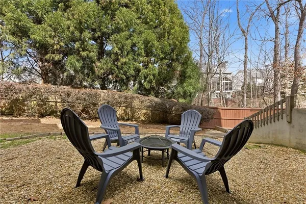 a view of a chairs and table in the outdoor