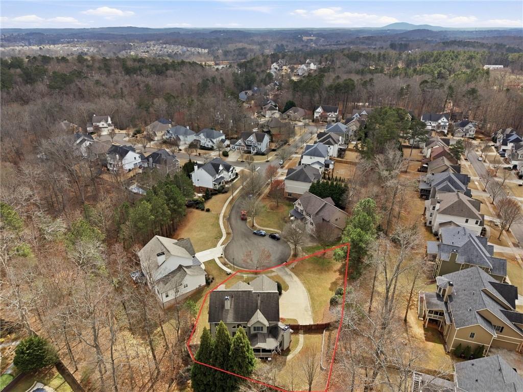 810 Ravenstone Way Canton, GA 30115 - Photo 47 of 51 an aerial view of a city with lots of residential buildings