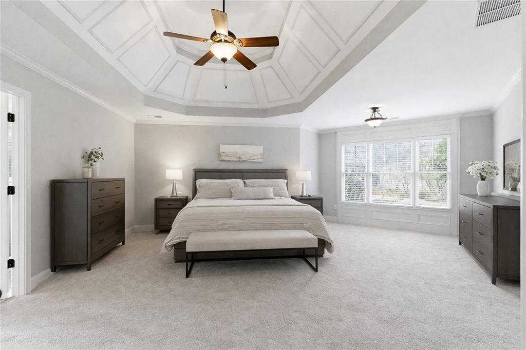 810 Ravenstone Way Canton, GA 30115 - Photo 7 of 51 a spacious bedroom with a bed dresser and a window