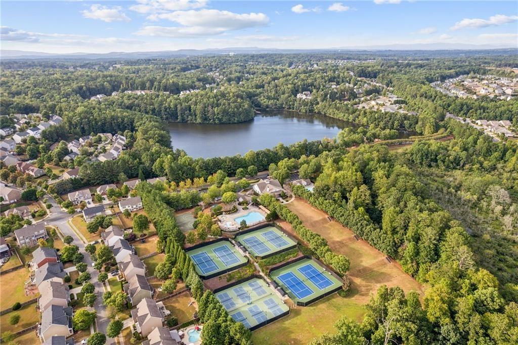 810 Ravenstone Way Canton, GA 30115 - Photo 9 of 51 an aerial view of residential building with outdoor space and lake view