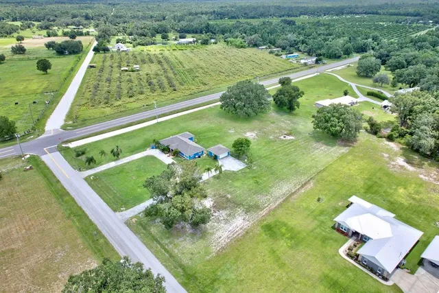 a view of a lake with a yard