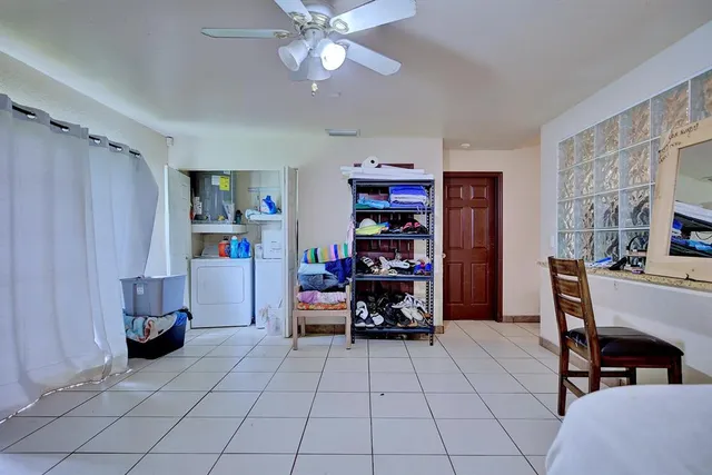 a view of a workspace with furniture