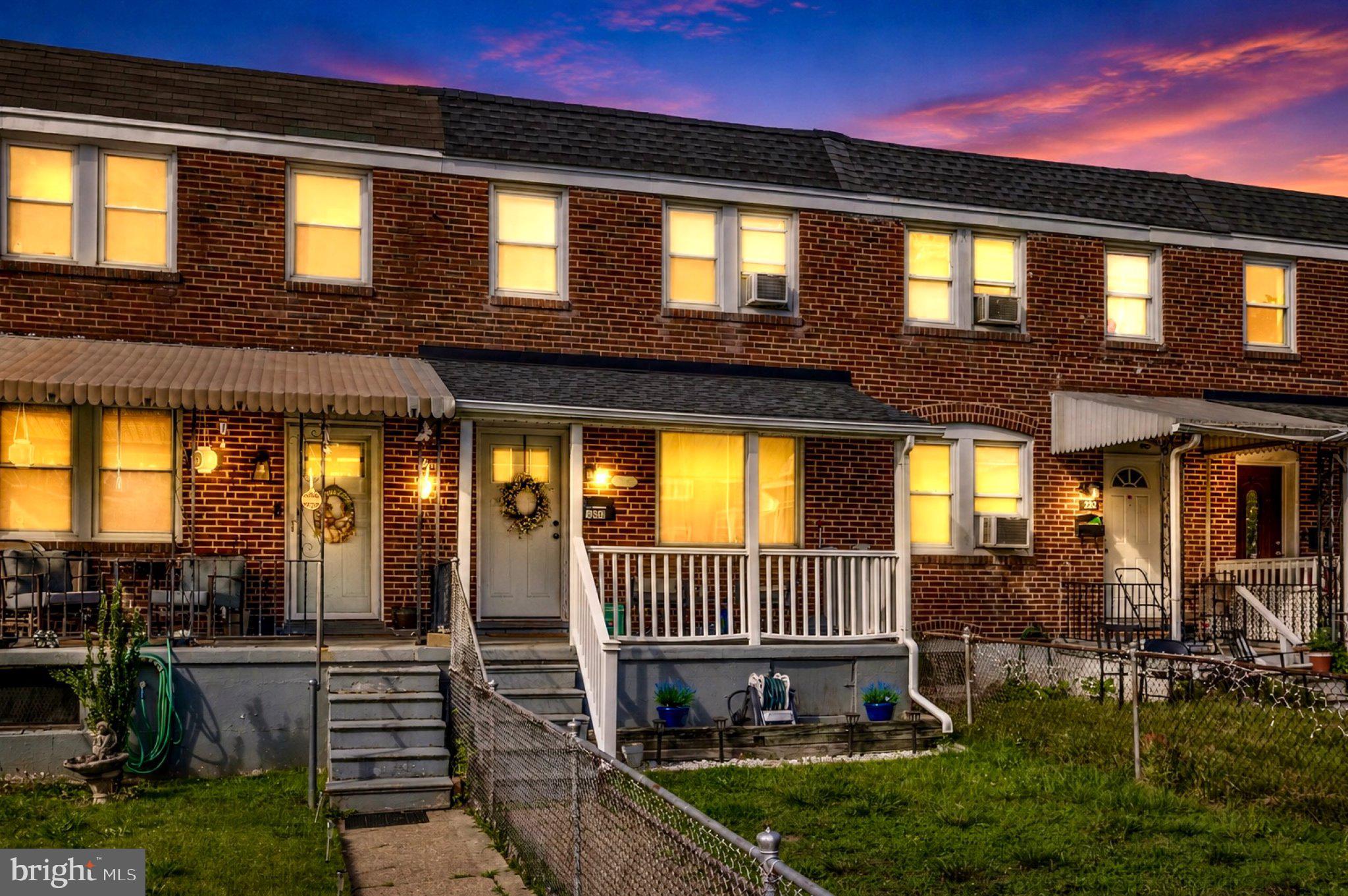 234 West Edgevale Road Baltimore, MD 21225 - Photo 37 of 45 Charming brick townhome at dusk.
