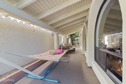 a view of living room with furniture and flat screen tv