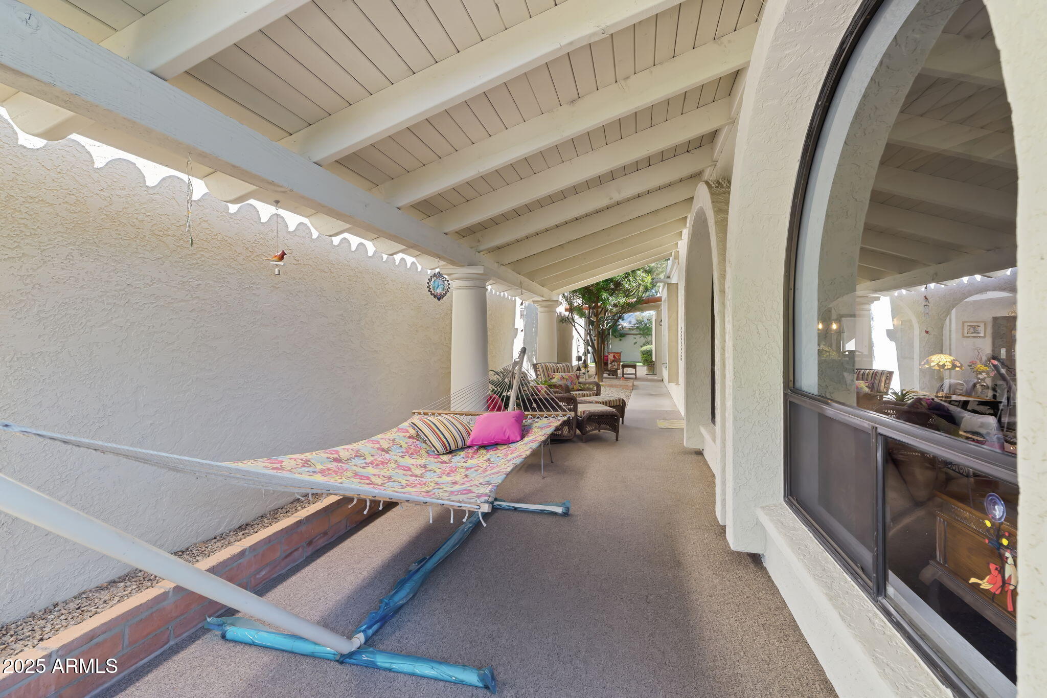 7217 North 6th Way Phoenix, AZ 85020 - Photo 12 of 43 a view of living room with furniture and flat screen tv