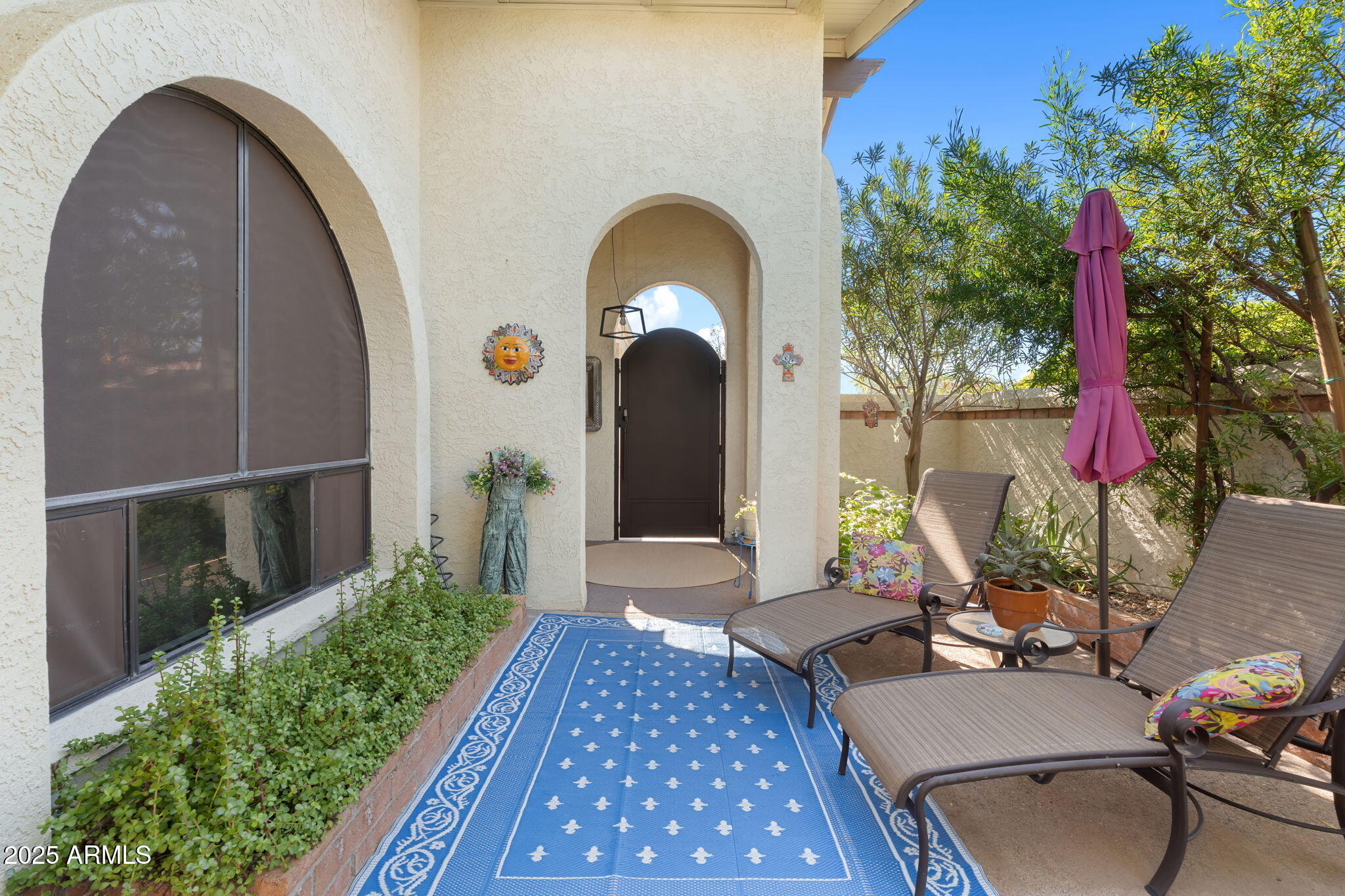 7217 North 6th Way Phoenix, AZ 85020 - Photo 13 of 43 a front view of a house with a yard