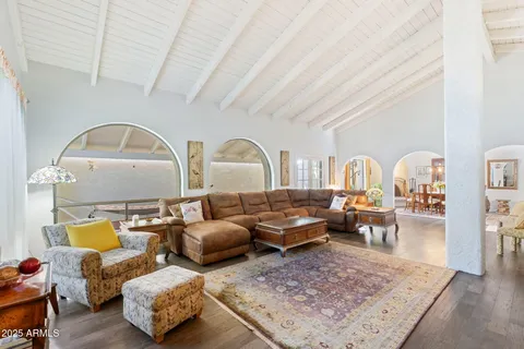 a living room with furniture and a couch