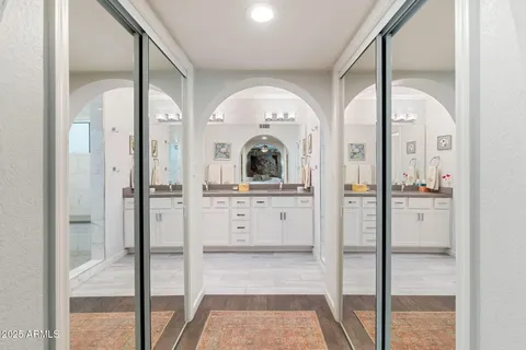 a view of a hallway with front door