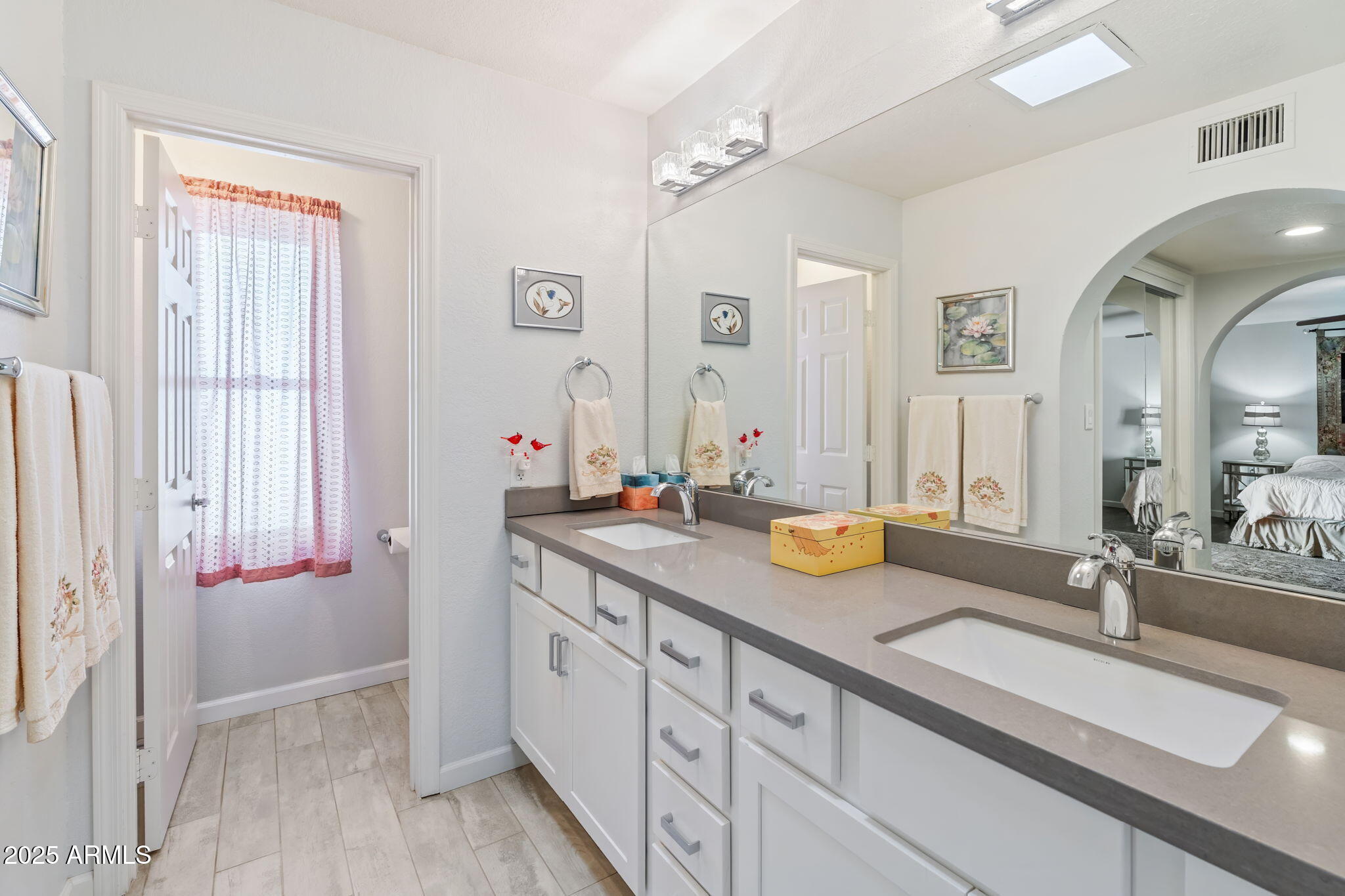 7217 North 6th Way Phoenix, AZ 85020 - Photo 31 of 43 a bathroom with a sink double vanity granite and a mirror