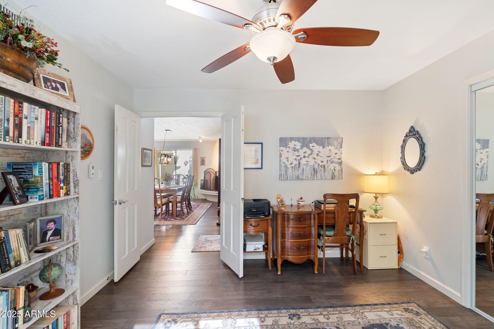 7217 North 6th Way Phoenix, AZ 85020 - Photo 35 of 43 a view of a workspace with furniture and wooden floor