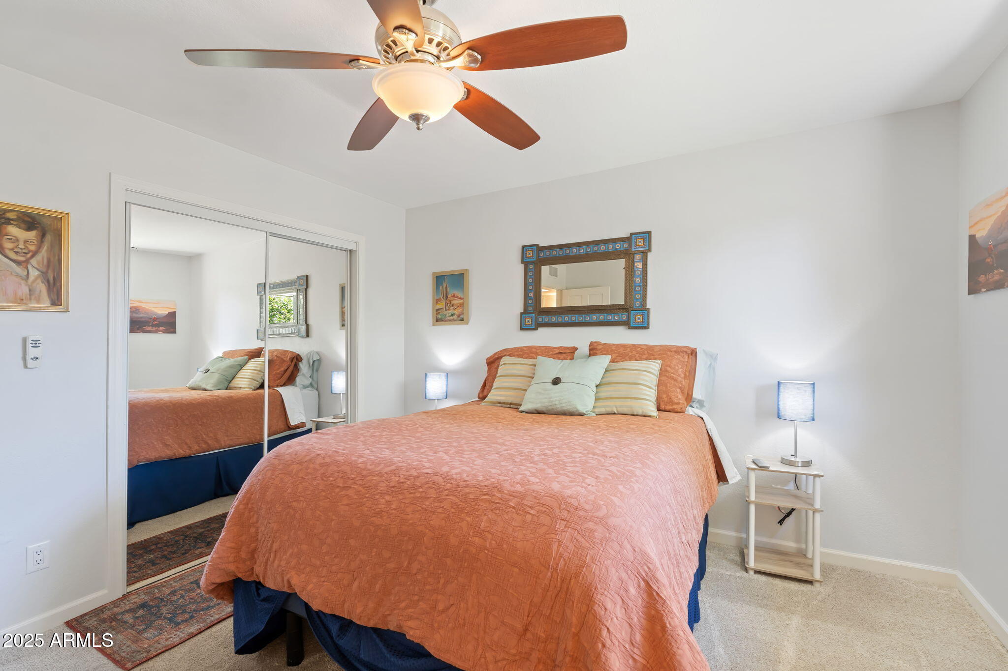 7217 North 6th Way Phoenix, AZ 85020 - Photo 37 of 43 a bedroom with a bed and a chandelier