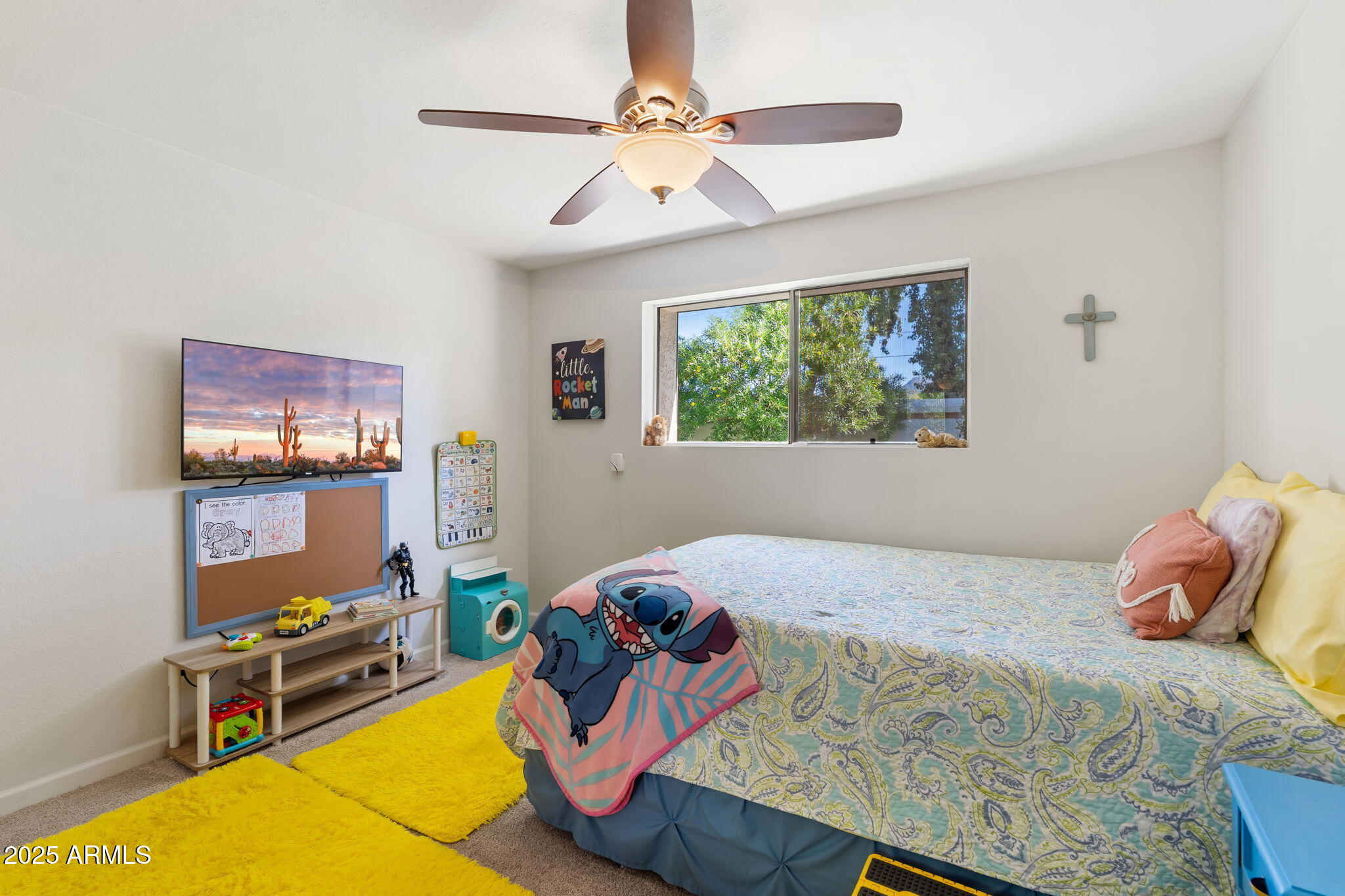 7217 North 6th Way Phoenix, AZ 85020 - Photo 41 of 43 a bed room with a bed and a tv