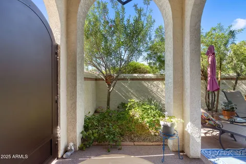 a view of balcony and garden