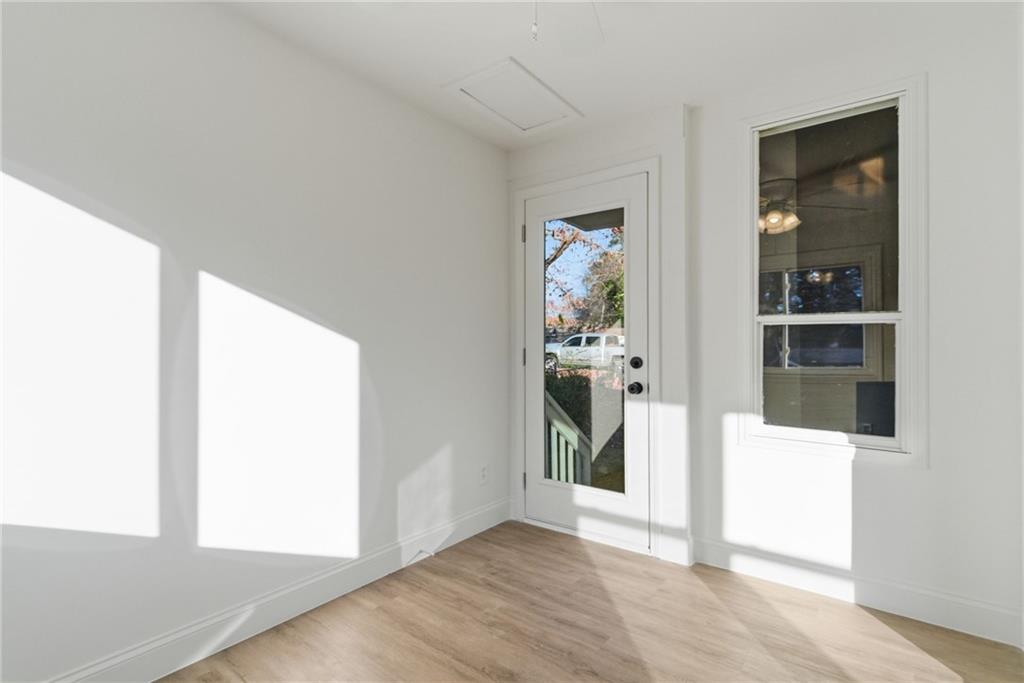 3447 Dry Creek Road Marietta, GA 30062 - Photo 16 of 50 a view of hallway with wooden floor