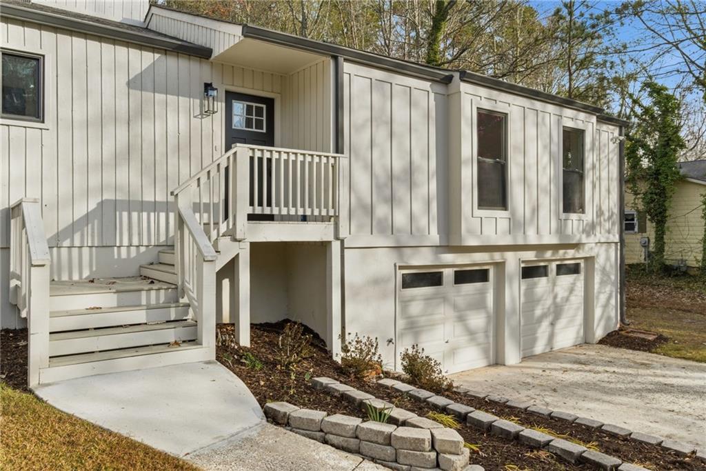 3447 Dry Creek Road Marietta, GA 30062 - Photo 4 of 50 a view of a house with a balcony