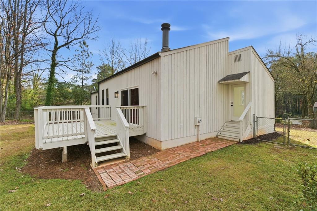 3447 Dry Creek Road Marietta, GA 30062 - Photo 42 of 50 a view of a chairs setting in backyard of the house