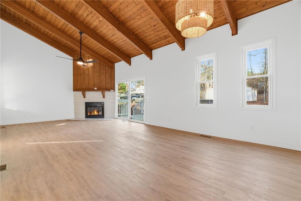 3447 Dry Creek Road Marietta, GA 30062 - Photo 6 of 50 a view of empty room with wooden floor and fan