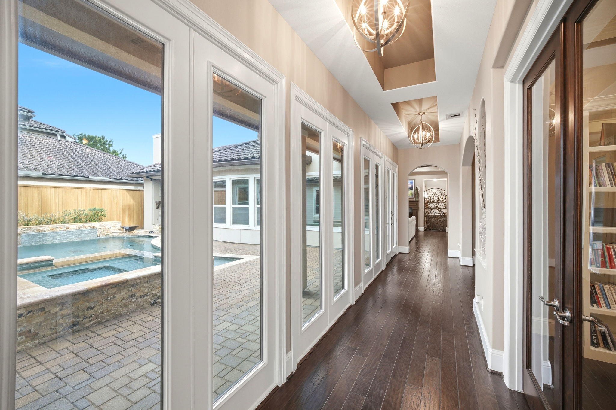 5815 Stratton Woods Drive Spring, TX 77389 - Photo 10 of 45 a view of a hallway with wooden floor and a bathroom
