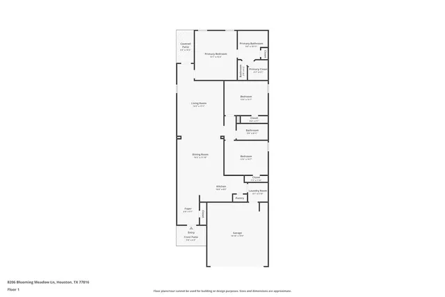 a view of a house with yard and potted plants