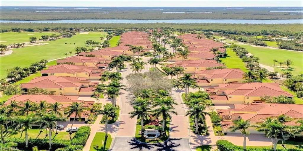 1276 Rialto Way, Unit 101 Naples, FL 34114 - Photo 32 of 37 a view of city and ocean