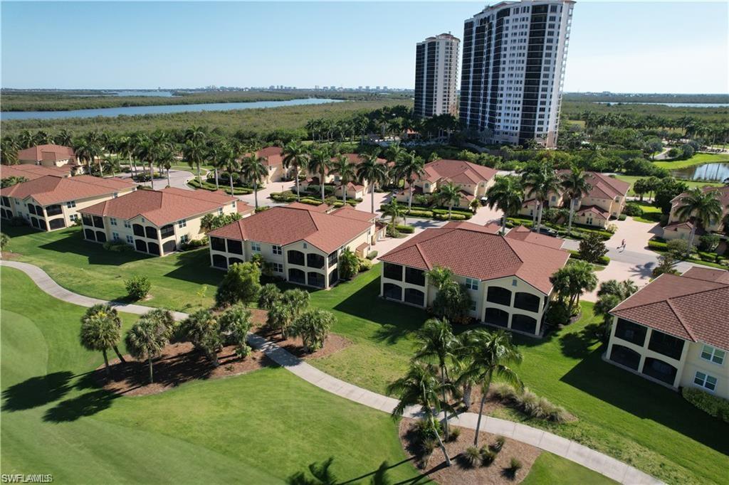 1276 Rialto Way, Unit 101 Naples, FL 34114 - Photo 34 of 37 an aerial view of multiple house