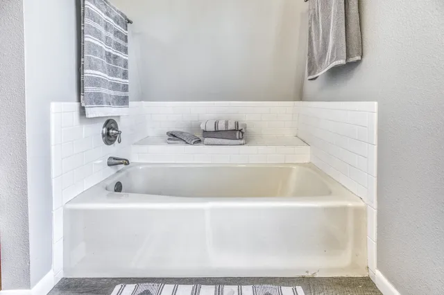 a bathroom with a bathtub