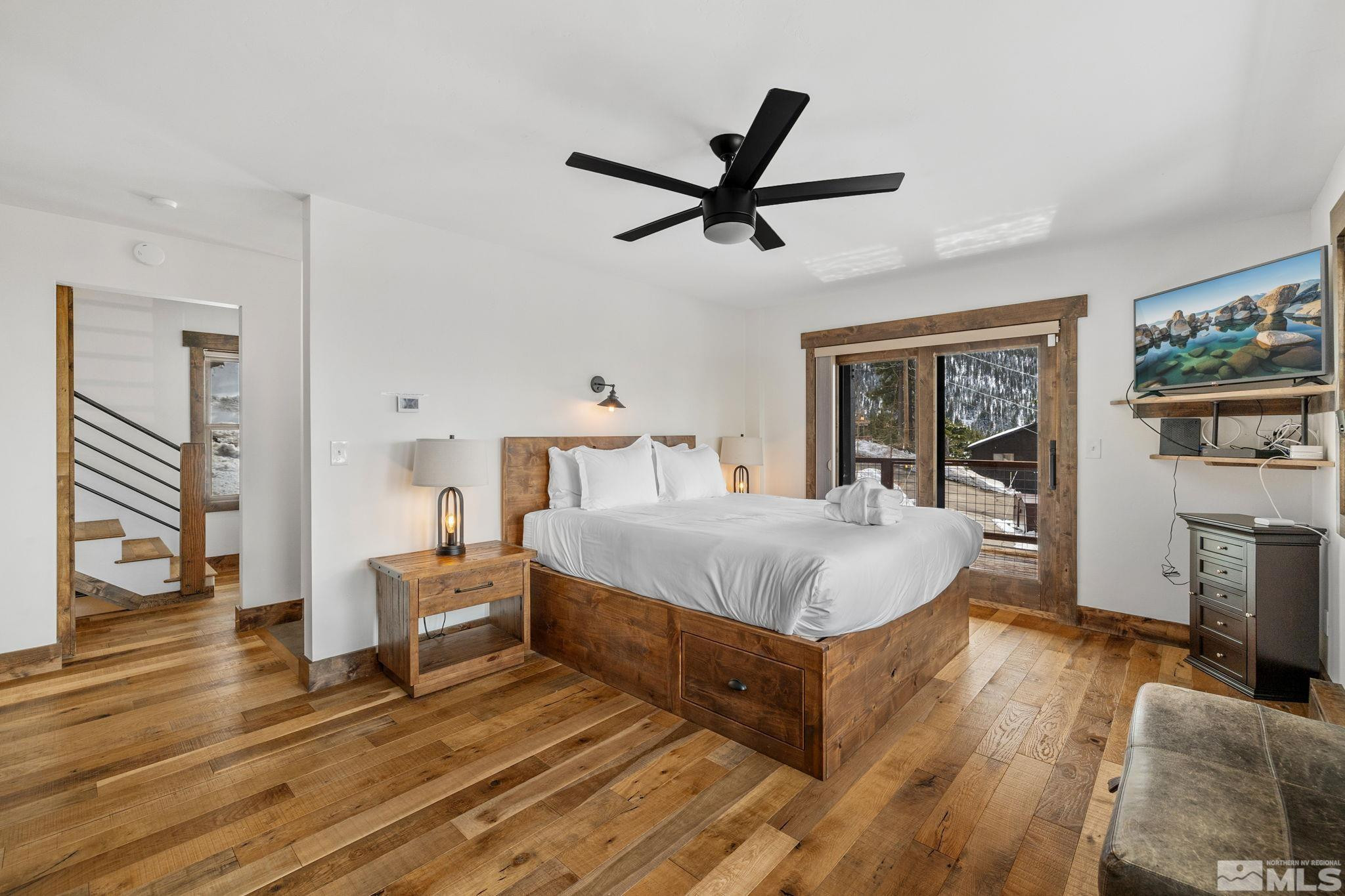 520 Laurel Lane Stateline, NV 89449 - Photo 16 of 29 a spacious bedroom with a bed and dresser