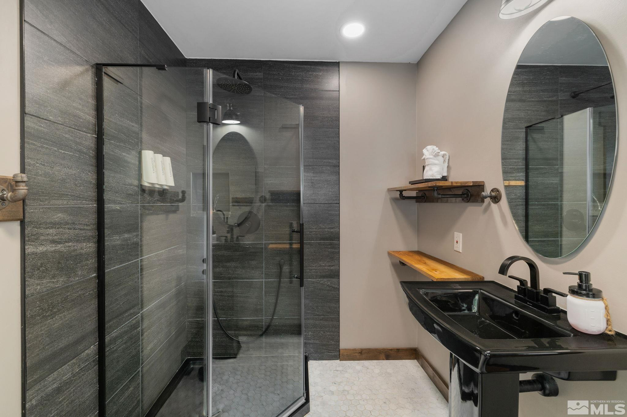 520 Laurel Lane Stateline, NV 89449 - Photo 25 of 29 a bathroom with a sink and mirror
