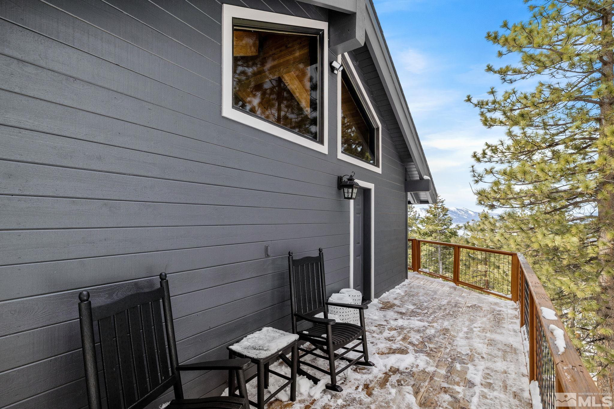 520 Laurel Lane Stateline, NV 89449 - Photo 26 of 29 a backyard of a house with table and chairs