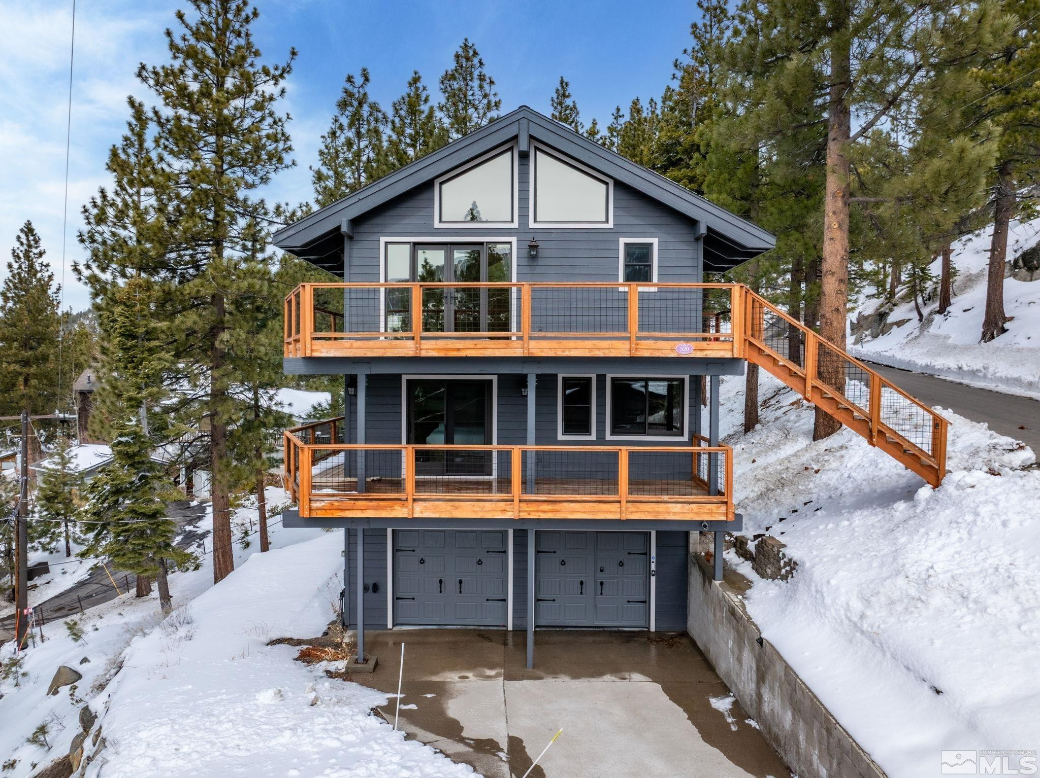 520 Laurel Lane Stateline, NV 89449 - Photo 3 of 29 a front view of a house with a yard
