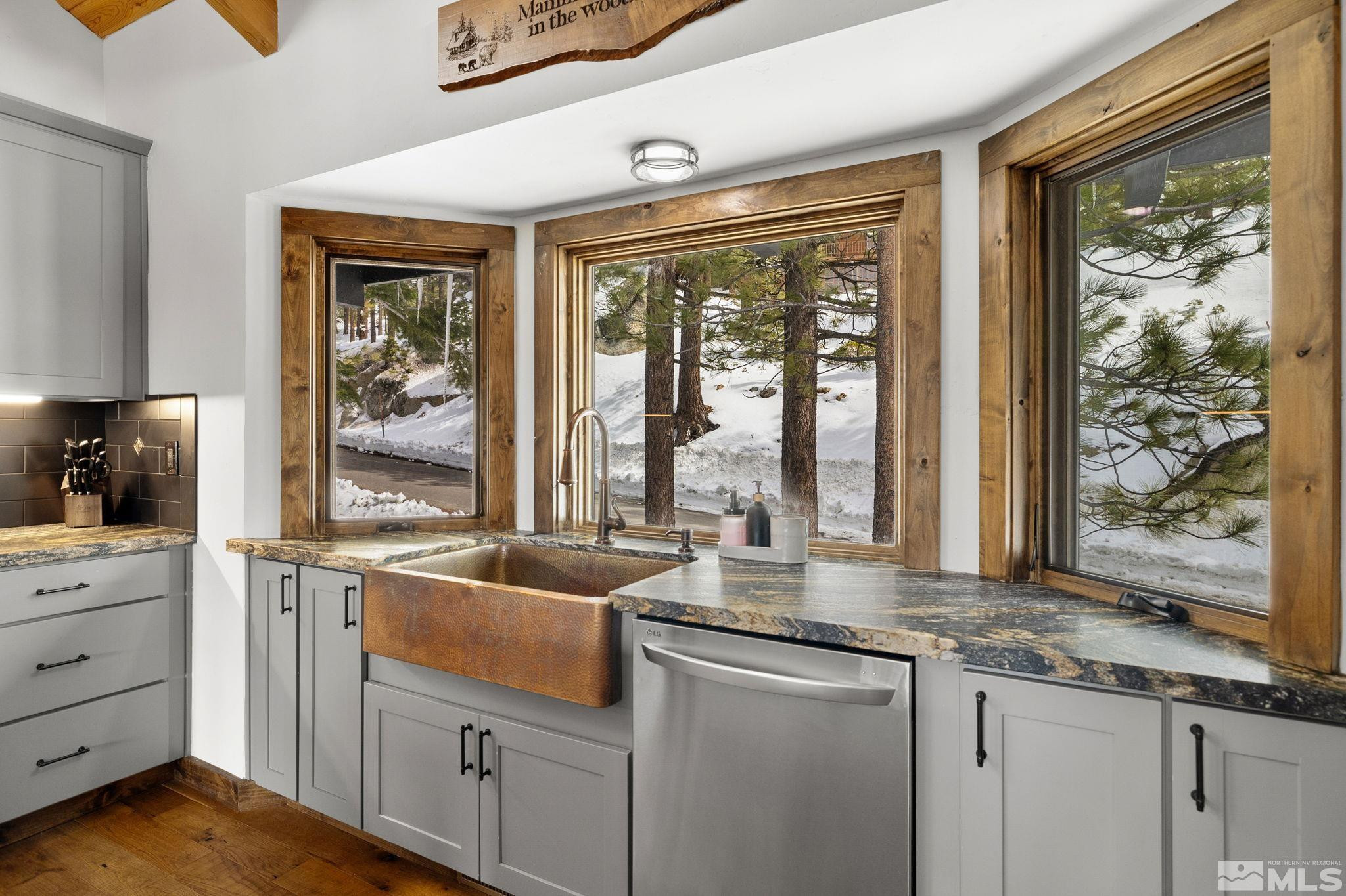 520 Laurel Lane Stateline, NV 89449 - Photo 10 of 29 a kitchen with granite countertop a sink and a window