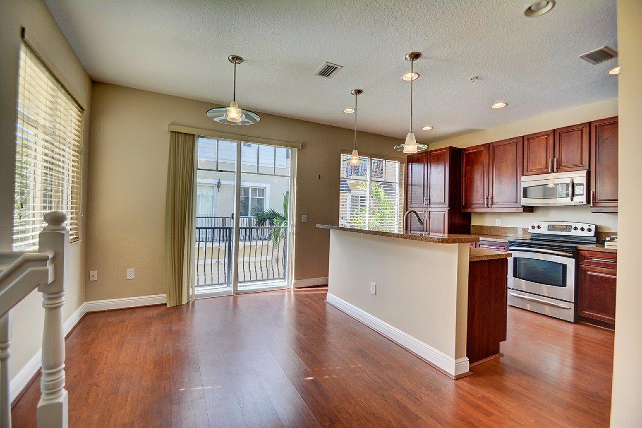 3821 Northwest 5th Terrace Boca Raton, FL 33431 - Photo 6 of 29 Kitchen with a Balcony