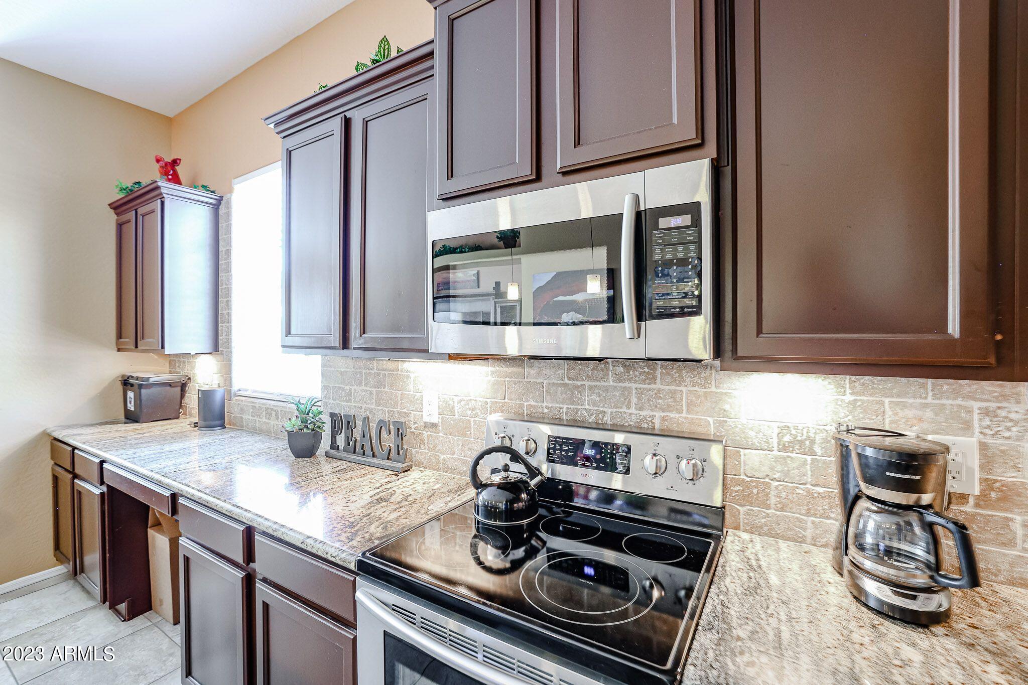3952 North Point Ridge Road Buckeye, AZ 85396 - Photo 11 of 31 Beautiful Stainless Appliances