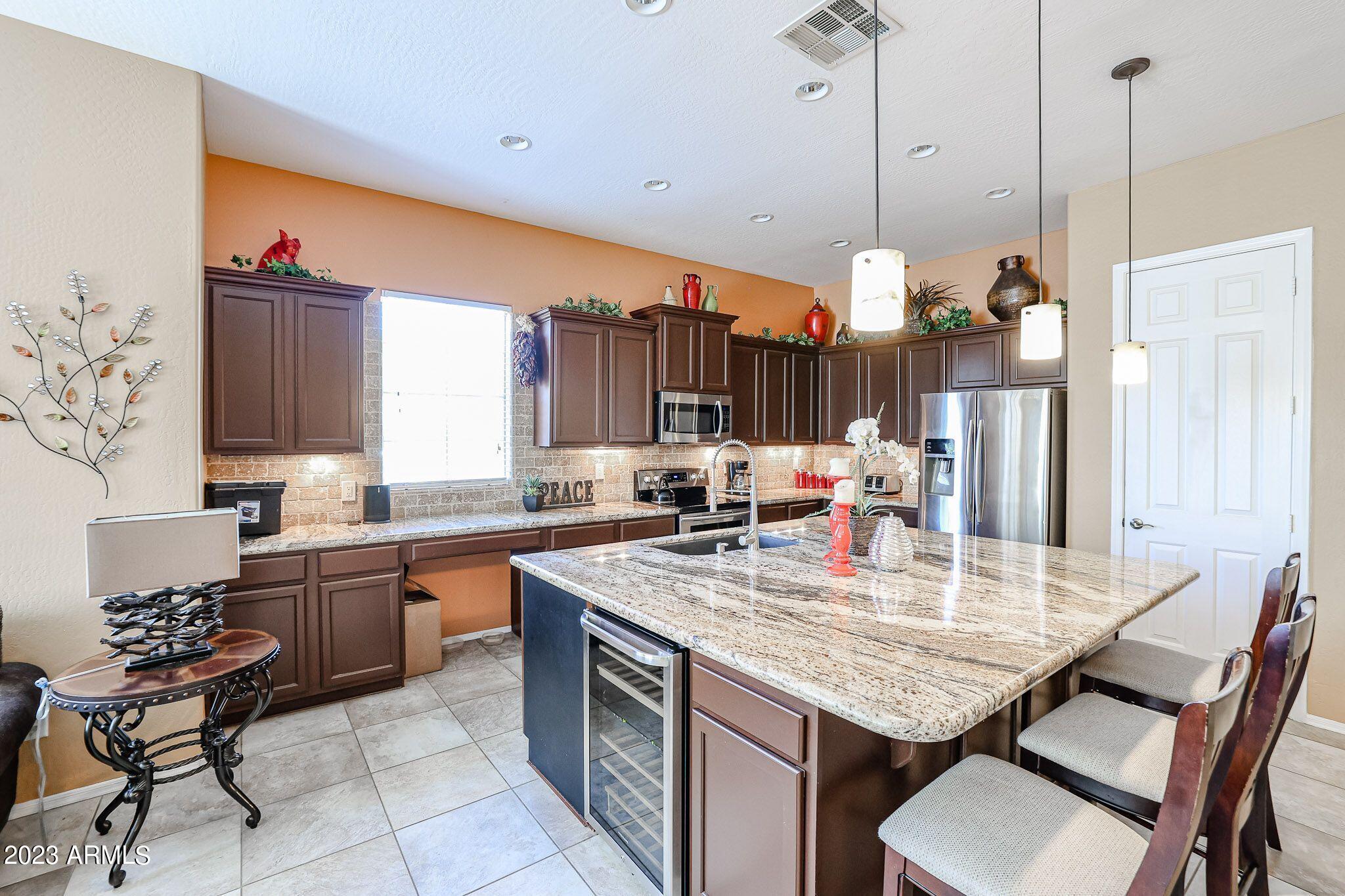 3952 North Point Ridge Road Buckeye, AZ 85396 - Photo 12 of 31 Huge kitchen Island