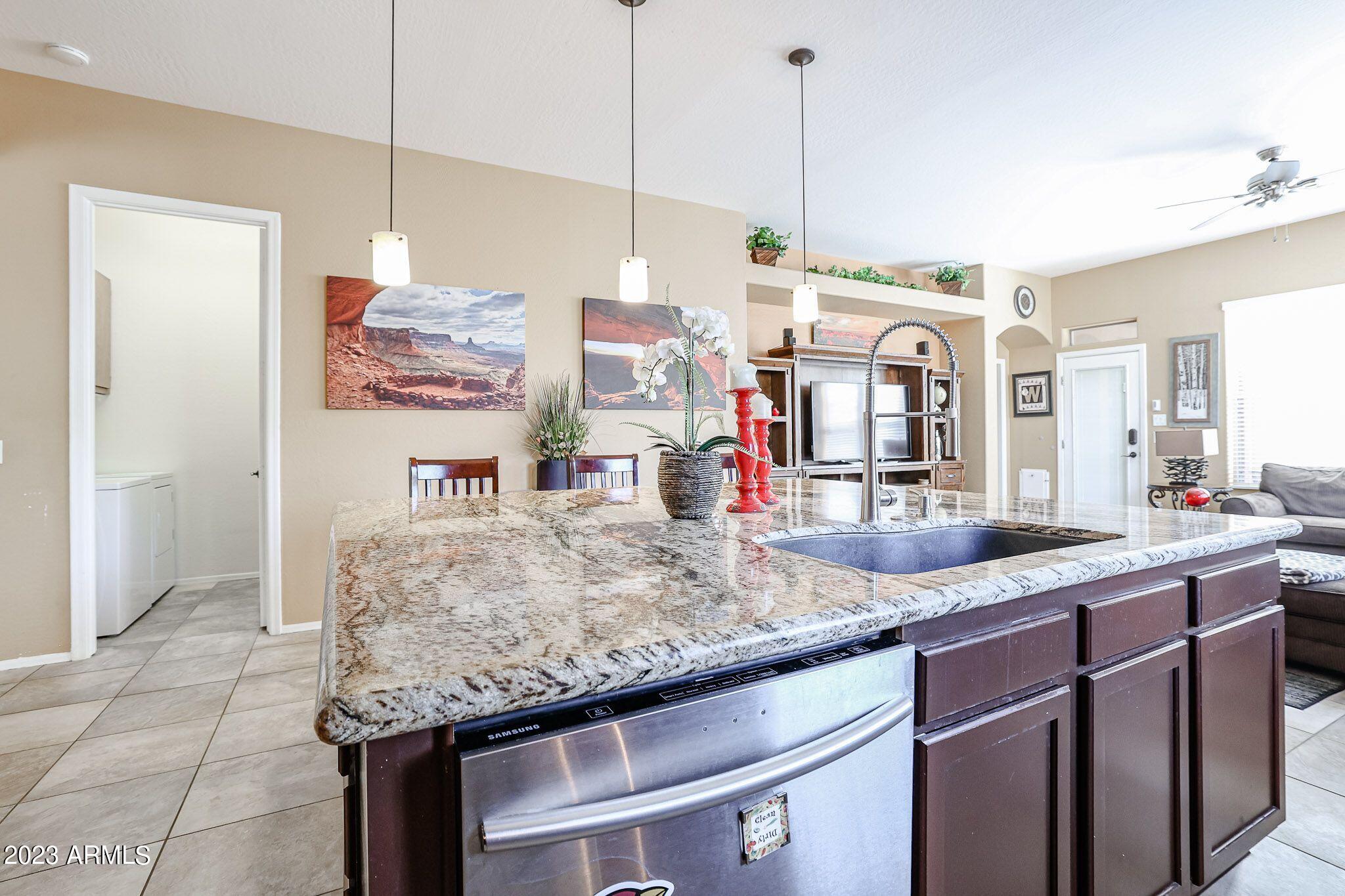3952 North Point Ridge Road Buckeye, AZ 85396 - Photo 13 of 31 Kitchen & Family Room